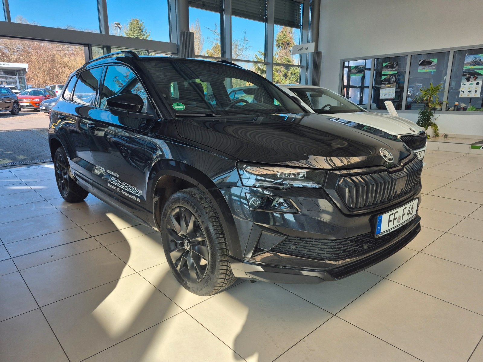 Fahrzeugabbildung SKODA Karoq 1.5 TSI DSG Sportline *inkl. Winterräder*